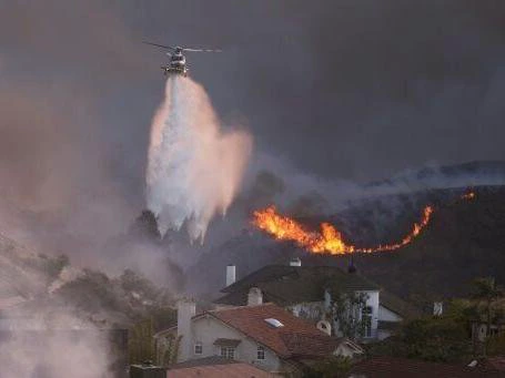 Displaced LA residents in shock at scale of fire destruction