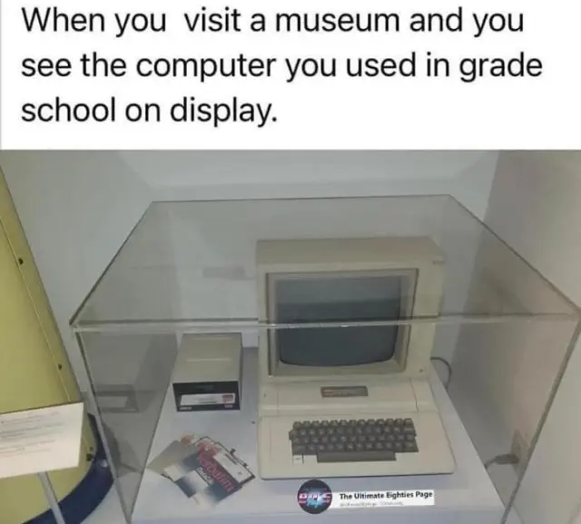Vintage computer exhibit humorously captioned about school memories, perfect for science memes enthusiasts.