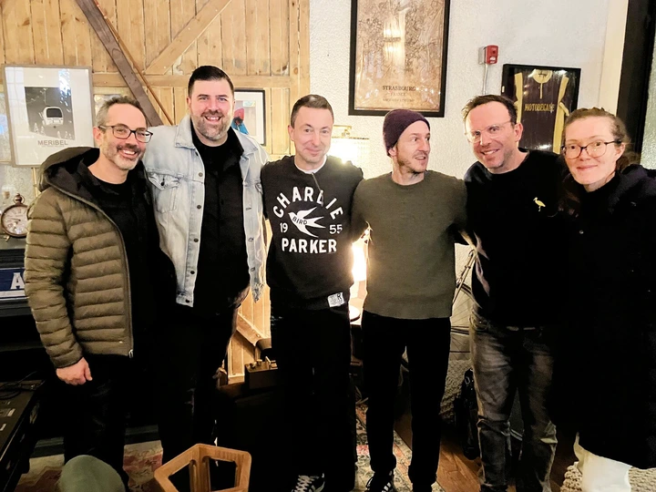 Nate Zaur, Tyler Dempsey, Will Sellenraad, Adam Lozier, along with Damien and Lydia Fitzgerald, the owners of La Cigogne.