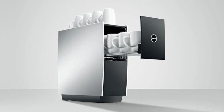 A sleek, silver coffee cup holder from JURA accessories features a partially open drawer displaying white cups, the perfect addition to your ultimate coffee station.