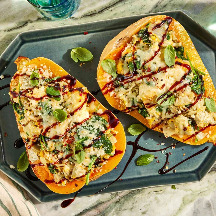 an image of the Cheesy Spinach & Artichoke Stuffed Butternut Squash