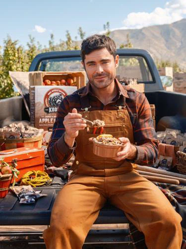 Kodiak, famous for its nutritious, high-protein whole-grain breakfast offerings, has teamed up with Zac Efron, the brand's Chief Brand Officer, to introduce a delicious new Apple Brown Sugar Pecan Oatmeal, further enhancing their range of breakfast choices.