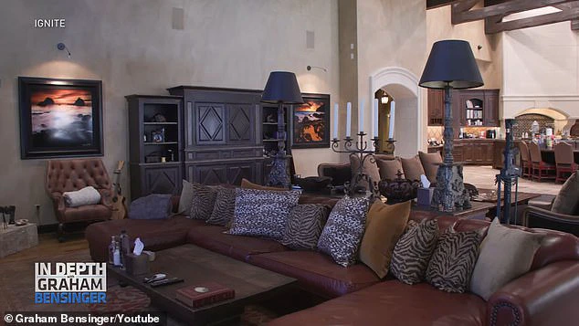 The residence exudes a vacation ambiance, featuring expansive open areas and soaring ceilings.