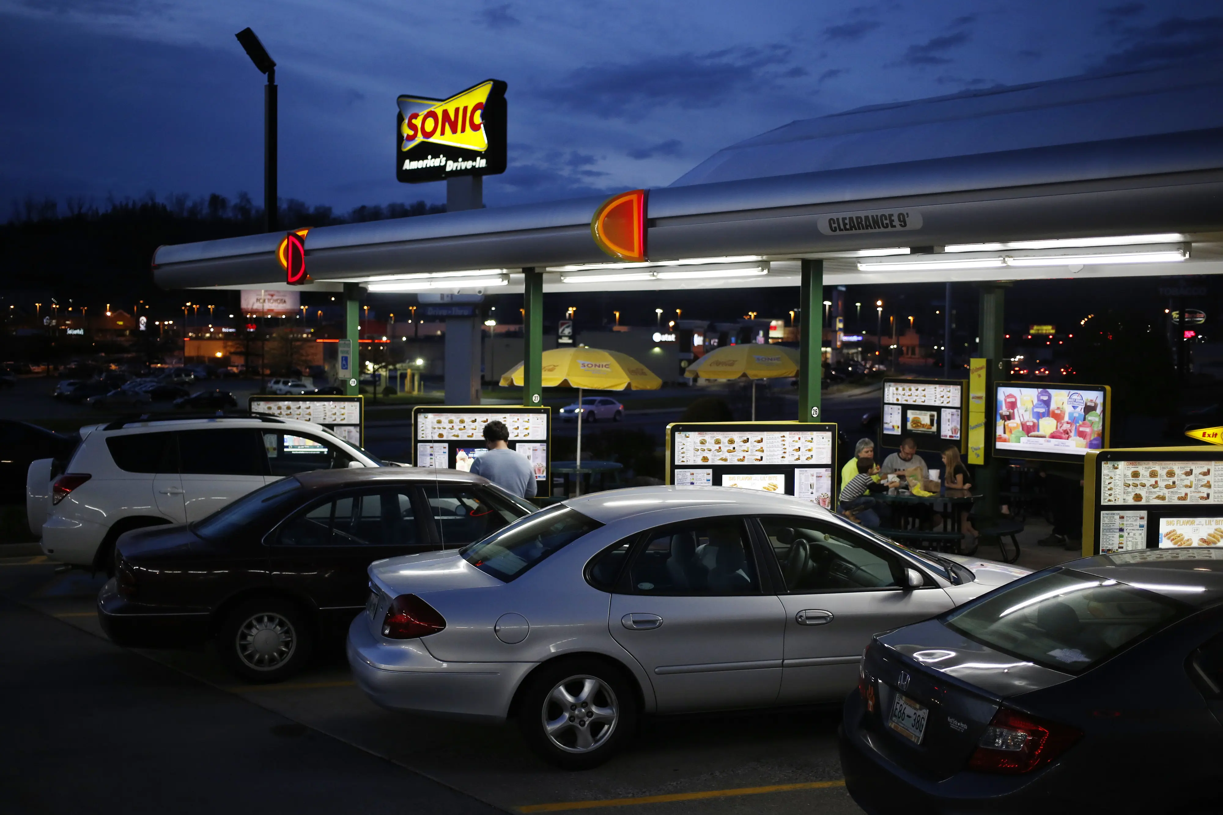 Customers dine at a Sonic drive-in fast food restaurant in Knoxville, Tennessee on March 25, 2017.