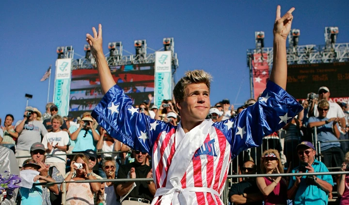 Gary Hall waves to fans after winning the men’s 50-meter freestyle final at the U.S. Olympic swim trials in Long Beach, on, Tuesday, July 13, 2004. Hall won 10 Olympic swimming medals, but they were lost to the Palisades fire this week.  (AP Photo/Mark J. Terrill)
