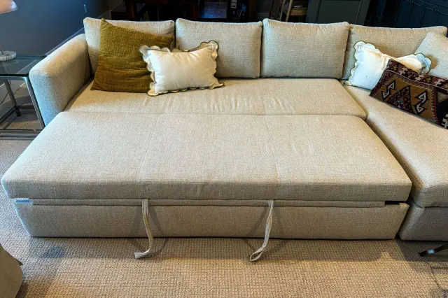 The Room & Board 90 Inch Pop-Up Platform Queen Sleeper Oxford Sectional with the sleeper extended