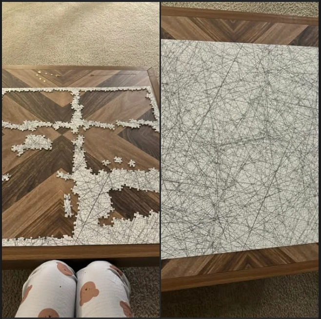 A coffee table with a partially completed complex line-drawing puzzle. Person wearing patterned leggings is visible in the foreground