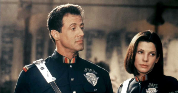 Image capture featuring Sandra Bullock and Sylvester Stallone in the film 'Demolition Man'. (Image Source: Warner Bros | Sunset Boulevard)