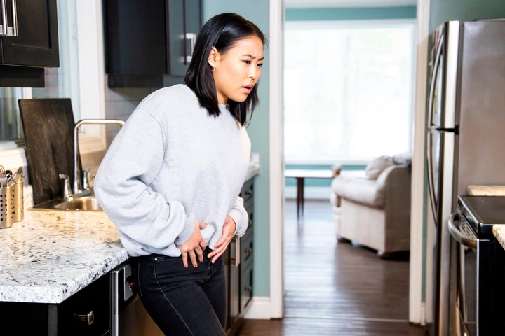 Woman in pelvic pain