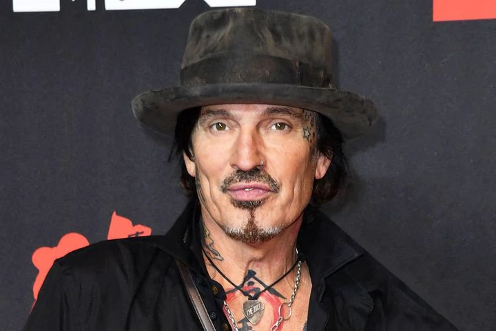 Tommy Lee and Brittany US internet personality Brittany Furlan arrive for the 2021 MTV Video Music Awards at Barclays Center in Brooklyn, New York on September 12, 2021