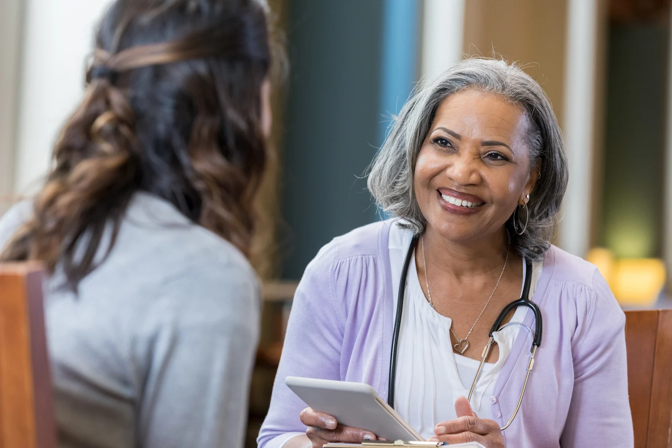 Woman talking to a doctor