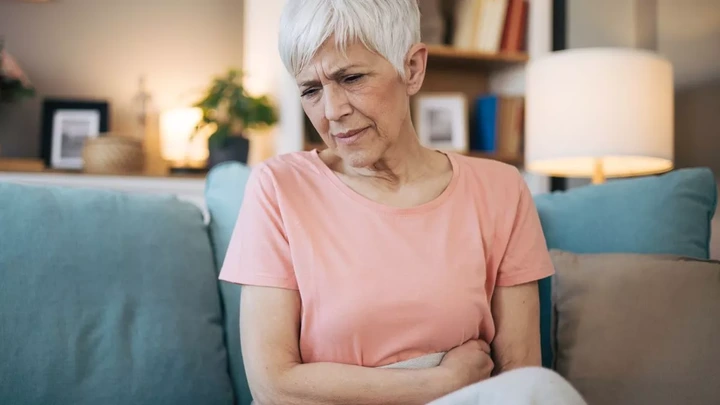 Woman with stomach pain