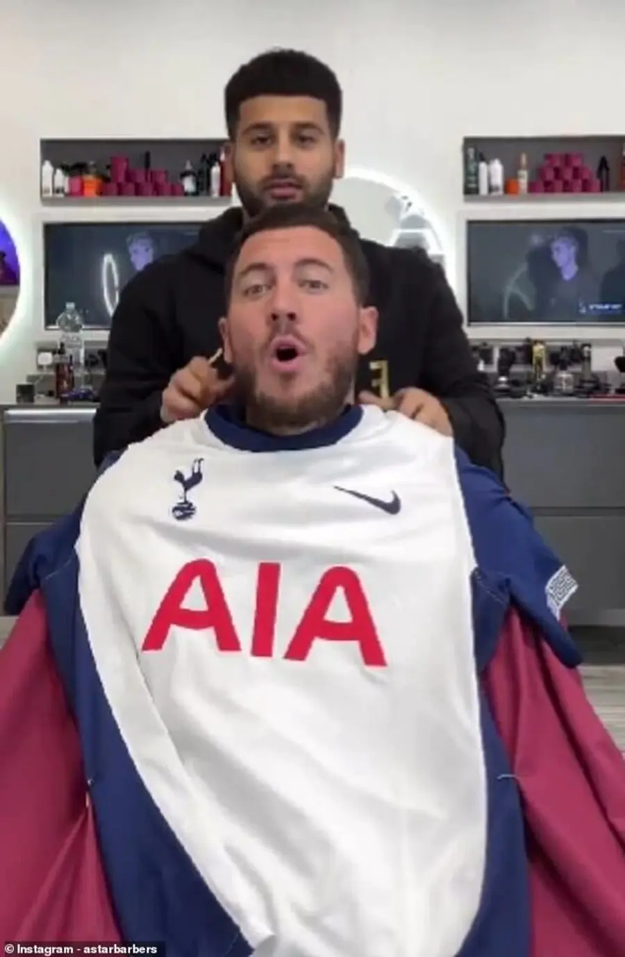 Hazard reacts hilariously after barber TRICKS him into wearing Tottenham shirt