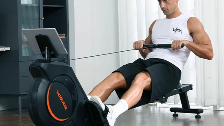 man using YOSUDA Rowing Machine 100
