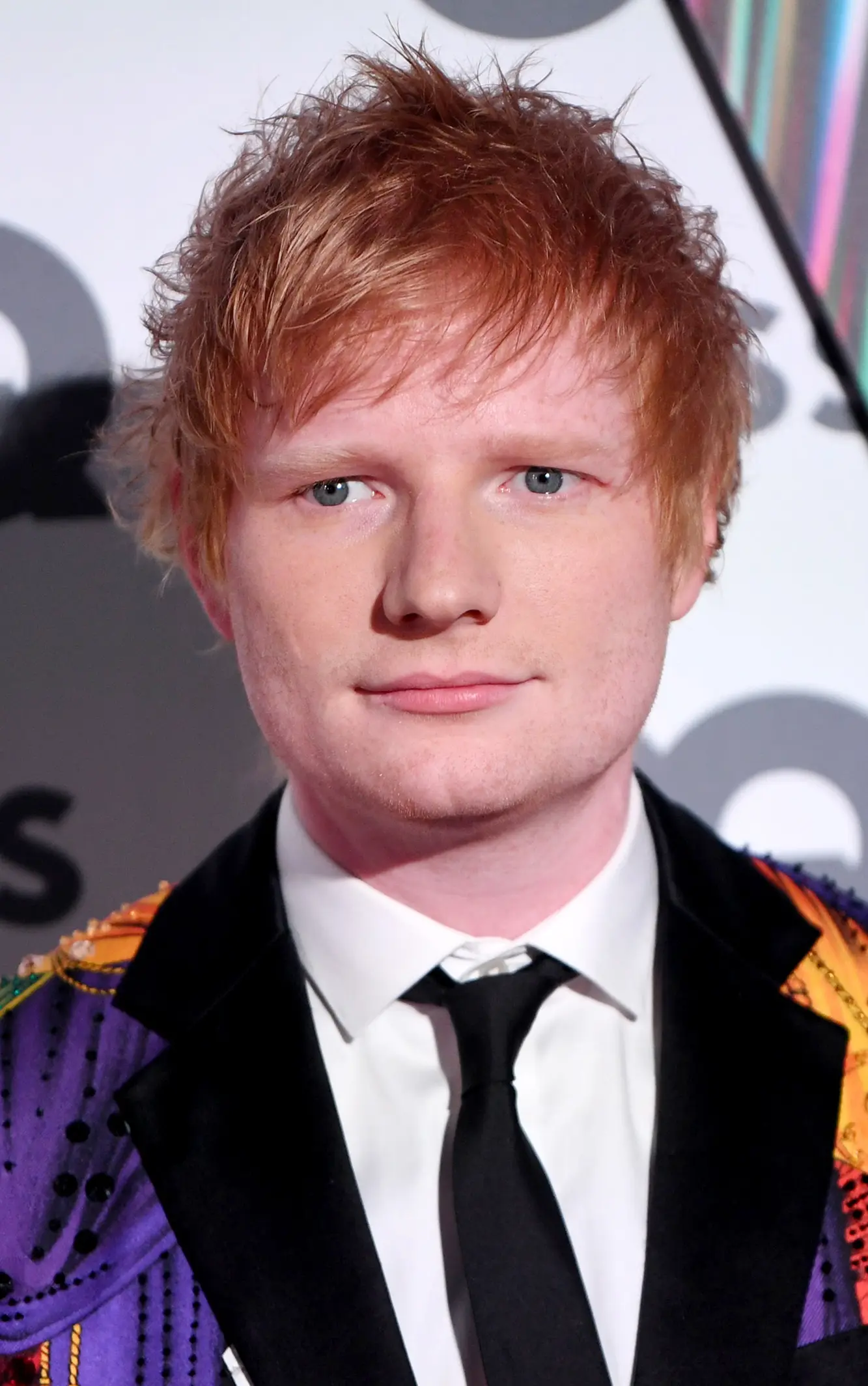 Edward Christopher Sheeran, commonly known as Ed Sheeran, is a renowned British singer-songwriter known for his melodic pop and acoustic sound.