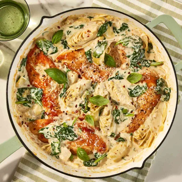 an overhead image of the Creamy Spinach and Artichoke Chicken Skillet