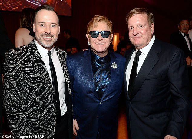 Among Ron's other well-known friends are Sir Elton John and David Furnish. They are seen together at an event in Hollywood in 2016.