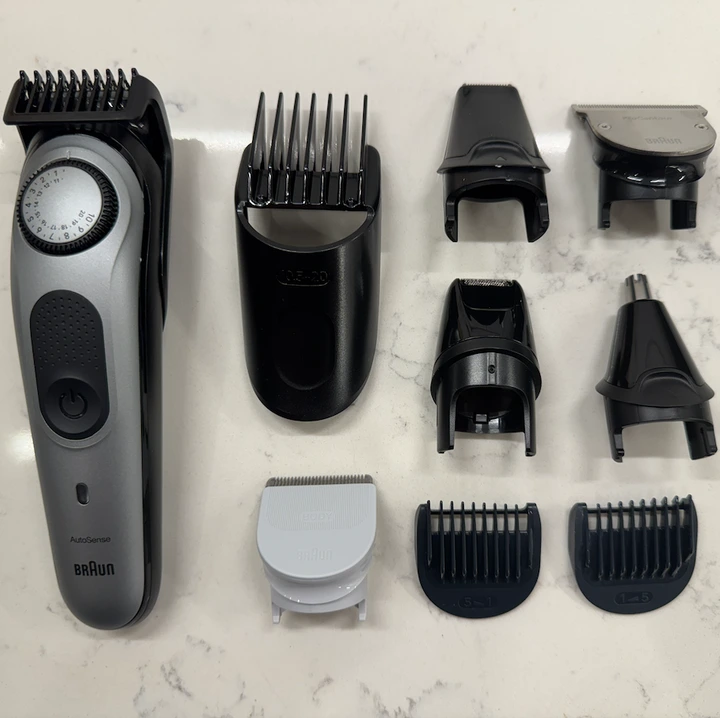 hair trimmer set with various attachments on a countertop